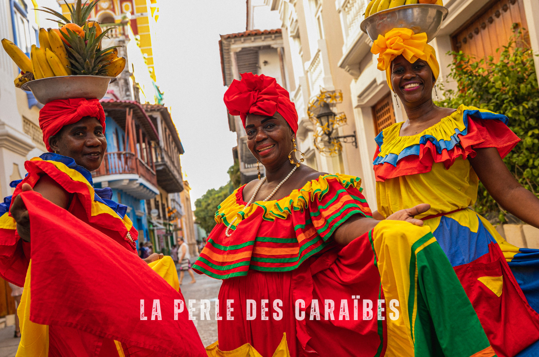 "Les Palenqueras de Carthagène, en Colombie, avec leurs robes colorées et paniers de fruits, symboles de la culture afro-colombienne."